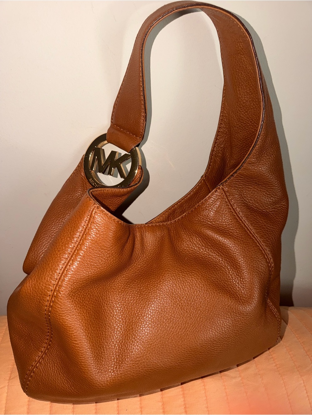 Michael Kors Cognac Pebbled Leather Shoulder Bag with Gold MK Charm